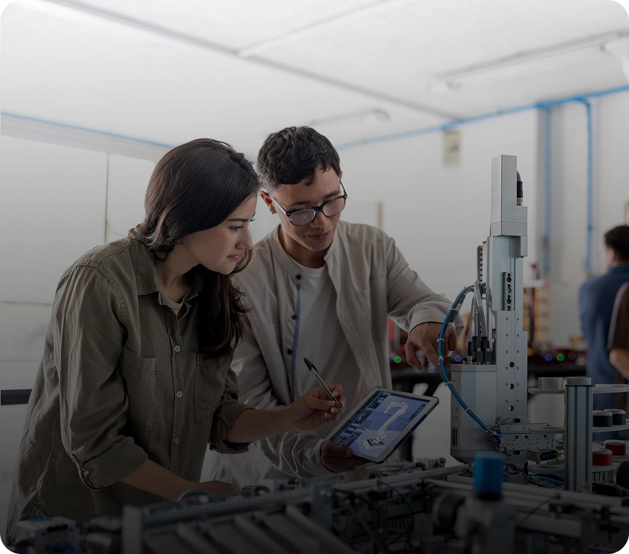 People collaborating in a technology lab environment.